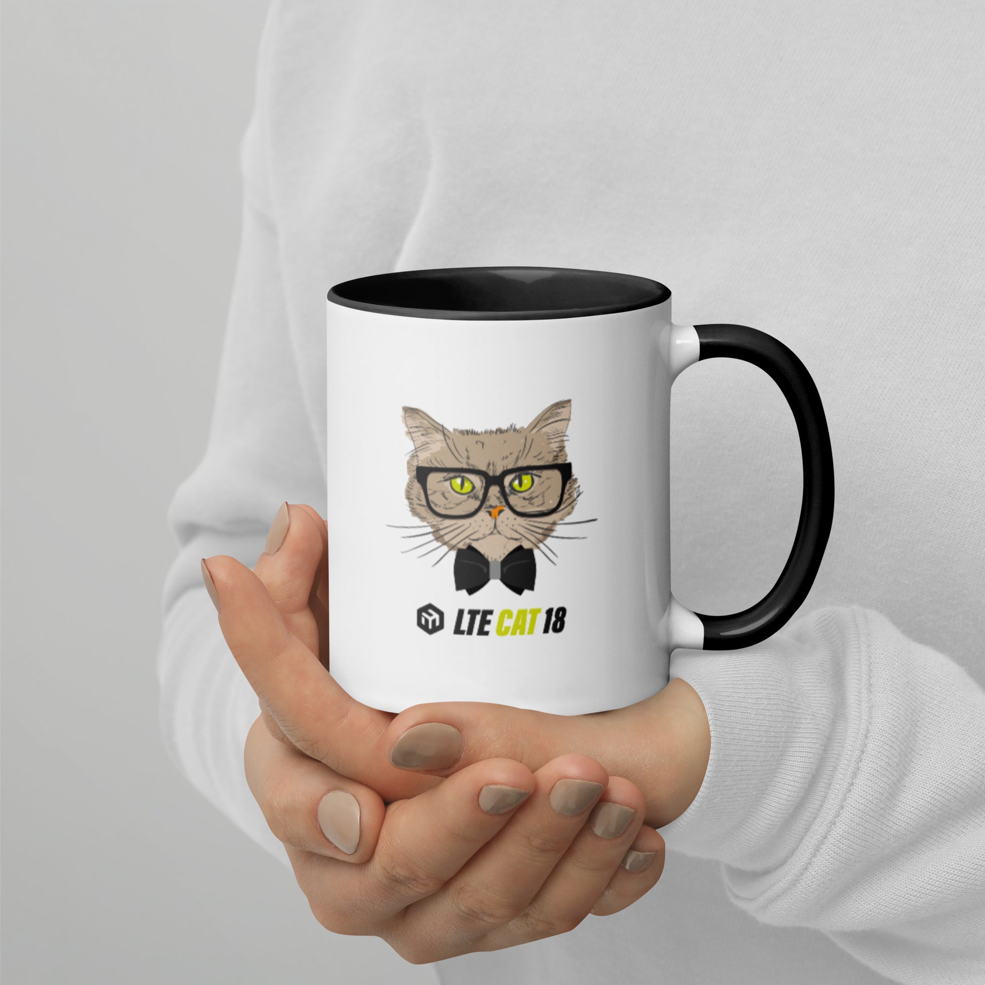 https://merch.mikrotik.com/cdn/shop/products/white-ceramic-mug-with-color-inside-black-11oz-right-62f23298542ce.jpg?v=1660039841&width=1946